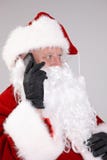 Retrato aislado de Papá Noel en el teléfono foto de archivo libre de regalías Retrato aislado de Papá Noel en el teléfono foto de archivo libre de regalías