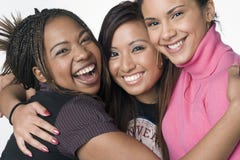 Retrato de tres muchachas adolescentes de la raza mezclada foto de archivo libre de regalías Retrato de tres muchachas adolescentes de la raza mezclada foto de archivo libre de regalías
