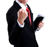 Retrato de um homem de negócio novo energético que aprecia o sucesso imagem de stock Retrato de um homem de negócio novo energético que aprecia o sucesso imagem de stock