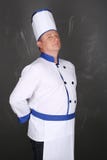 Retrato de un workwear que lleva del cocinero hermoso fotografía de archivo libre de regalías Retrato de un workwear que lleva del cocinero hermoso fotografía de archivo libre de regalías