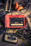 Retro audio cassette with headphones and walkman Stock Images Retro audio cassette with headphones and walkman Stock Images