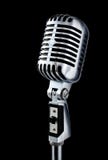 Retro Mic. Vintage Microphone Isolated Over Black Background Retro Mic. Vintage Microphone Isolated Over Black Background