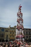 REUS, ΙΣΠΑΝΙΑ - 25 ΟΚΤΩΒΡΊΟΥ 2014: Η απόδοση Castells, castell είναι ένας ανθρώπινος πύργος που χτίζεται παραδοσιακά στα φεστιβάλ στοκ φωτογραφία REUS, ΙΣΠΑΝΙΑ - 25 ΟΚΤΩΒΡΊΟΥ 2014: Η απόδοση Castells, castell είναι ένας ανθρώπινος πύργος που χτίζεται παραδοσιακά στα φεστιβάλ στοκ φωτογραφία