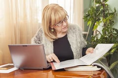 Reviewing Documents And Reports Stock Image Reviewing Documents And Reports Stock Image