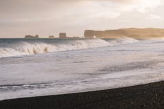 Reynisfjara beach and Cape Dyrholaey in Iceland stock photos Reynisfjara beach and Cape Dyrholaey in Iceland stock photos