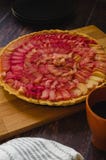 Rhubarb Ginger Custard Pie on the Wooden Board stock photos Rhubarb Ginger Custard Pie on the Wooden Board stock photos