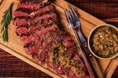 Ribeye steak and mustard sauce with pickles. royalty free stock photo Ribeye steak and mustard sauce with pickles. royalty free stock photo