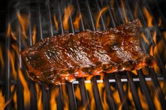 Ribs On A Flaming Hot Grill Stock Image Ribs On A Flaming Hot Grill Stock Image