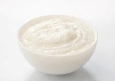 Rice porridge in white bowl