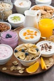 Rich Breakfast Buffet With Cereals, Yoghurt And Fresh Fruit Stock Image