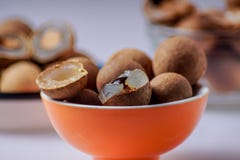Longan fruit; in a plate; on; white; background. royalty free stock photography Longan fruit; in a plate; on; white; background. royalty free stock photography