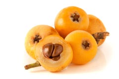 Ripe loquat or Eriobotrya japonica with leaf isolated on white background stock image Ripe loquat or Eriobotrya japonica with leaf isolated on white background stock image