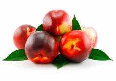 Ripe Peach (Nectarine) With Green Leafs Royalty Free Stock Photos
