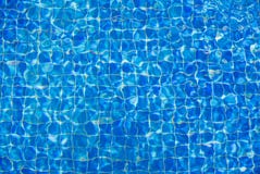 Ripplings Over Blue Swimming Pool Royalty Free Stock Images