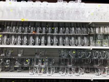 RISHON LE ZION, ISRAEL- FEBRUARY 2, 2018: Empty glass cups are sold in a store on a shelf for a modern kitchen Stock Photos RISHON LE ZION, ISRAEL- FEBRUARY 2, 2018: Empty glass cups are sold in a store on a shelf for a modern kitchen Stock Photos