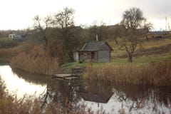 River in the fall on the shore house royalty free stock photography River in the fall on the shore house royalty free stock photography