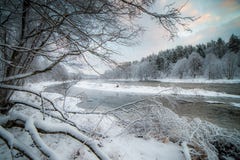 River landscape in snowy forest