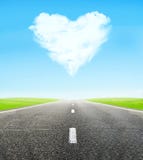 Road And Cloudy Heart In Sky Royalty Free Stock Photography
