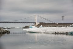 Road bridge crossing the icelake and glacier water in Jokulsarlo royalty free stock photo Road bridge crossing the icelake and glacier water in Jokulsarlo royalty free stock photo