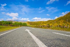 Road Passing Through Landscape Against Blue Sky Stock Photography Road Passing Through Landscape Against Blue Sky Stock Photography
