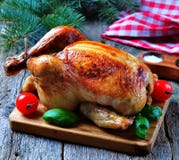 Roast Chicken On A Wooden Table Royalty Free Stock Photo