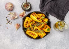 Delicatessen appetizer of roasted bell peppers with garlic, thyme and spices royalty free stock photos Delicatessen appetizer of roasted bell peppers with garlic, thyme and spices royalty free stock photos
