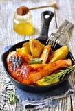 Roasted chicken leg with potato. Royalty Free Stock Photos Roasted chicken leg with potato. Royalty Free Stock Photos