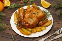 Roasted whole chicken with Christmas decoration. royalty free stock photo Roasted whole chicken with Christmas decoration. royalty free stock photo