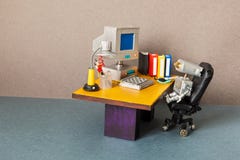 Robot office manager, retro style workplace. Old table vintage computer, desk lamp and books. Stylish black leather
