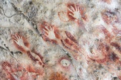 Rock Drawing, Painted Hands on Rocks, Arguni, Berau Bay, Indonesia. Rock Painting, Rock Pictures