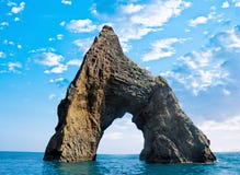 Rock In The Form Of An Arch In The Sea Stock Image