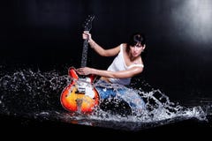 Rock-n-roll Girl Playing A Guitar Stock Photography Rock-n-roll Girl Playing A Guitar Stock Photography
