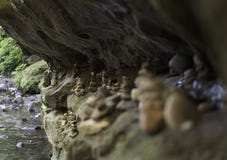 Rock stacking along a ledge royalty free stock image Rock stacking along a ledge royalty free stock image