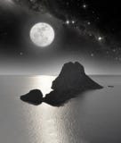 Rocky island in moonlight