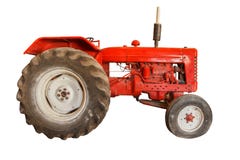 Rode uitstekende die tractor op witte achtergrond wordt geïsoleerd royalty-vrije stock foto Rode uitstekende die tractor op witte achtergrond wordt geïsoleerd royalty-vrije stock foto