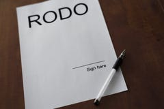 Rodo word on white paper with pen od wood desk. stock photo Rodo word on white paper with pen od wood desk. stock photo