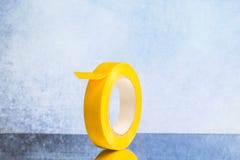 Roll yellow electrical tape on a grey background royalty free stock photo Roll yellow electrical tape on a grey background royalty free stock photo