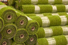 Rolls artificial grass in store of building materials. royalty free stock photography Rolls artificial grass in store of building materials. royalty free stock photography