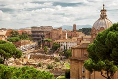 Roman Forum and Coliseum in the distance in Rome royalty free stock photos Roman Forum and Coliseum in the distance in Rome royalty free stock photos