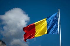 Romanian Flag And Clouds Royalty Free Stock Photos