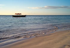 Beautiful Beach with Small Fishing Boat at Michamvi Beach, Zanzibar stock photos Beautiful Beach with Small Fishing Boat at Michamvi Beach, Zanzibar stock photos
