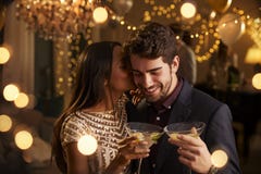 Romantic Couple Enjoying Cocktail Party Together stock image Romantic Couple Enjoying Cocktail Party Together stock image