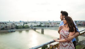 Romantic couple sightseeing and smiling royalty free stock images Romantic couple sightseeing and smiling royalty free stock images