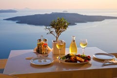 Romantic dinner for two at sunset.Greece, Santorini royalty free stock photos Romantic dinner for two at sunset.Greece, Santorini royalty free stock photos
