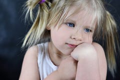 Romantic portrait of a little girl on a black background Royalty Free Stock Photos Romantic portrait of a little girl on a black background Royalty Free Stock Photos