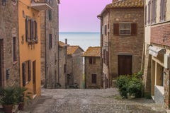 Romantic View Of Monte Del Lago Medieval Village On Trasimeno Lake At Sunset Royalty Free Stock Photos Romantic View Of Monte Del Lago Medieval Village On Trasimeno Lake At Sunset Royalty Free Stock Photos