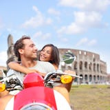 Rome couple on scooter by Colosseum, Italy Royalty Free Stock Images Rome couple on scooter by Colosseum, Italy Royalty Free Stock Images