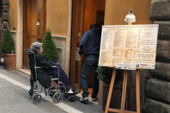 Rome, Italy - APRIl 9, 2017 : The Caregiver And Disabled Woman G Royalty Free Stock Images