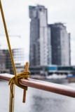 Rope tied around hook on handrail Royalty Free Stock Photography Rope tied around hook on handrail Royalty Free Stock Photography