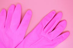 Rosa Handschuhnahaufnahme auf rosa Hintergrund, lizenzfreie stockfotos Rosa Handschuhnahaufnahme auf rosa Hintergrund, lizenzfreie stockfotos
